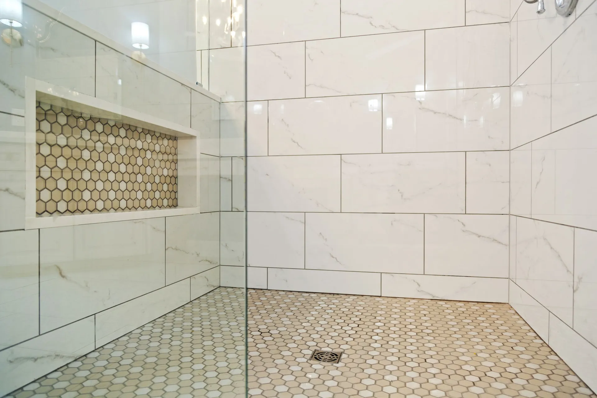 Walk-in shower, Custom tilework — Cumming bathroom remodel by HomeVantage