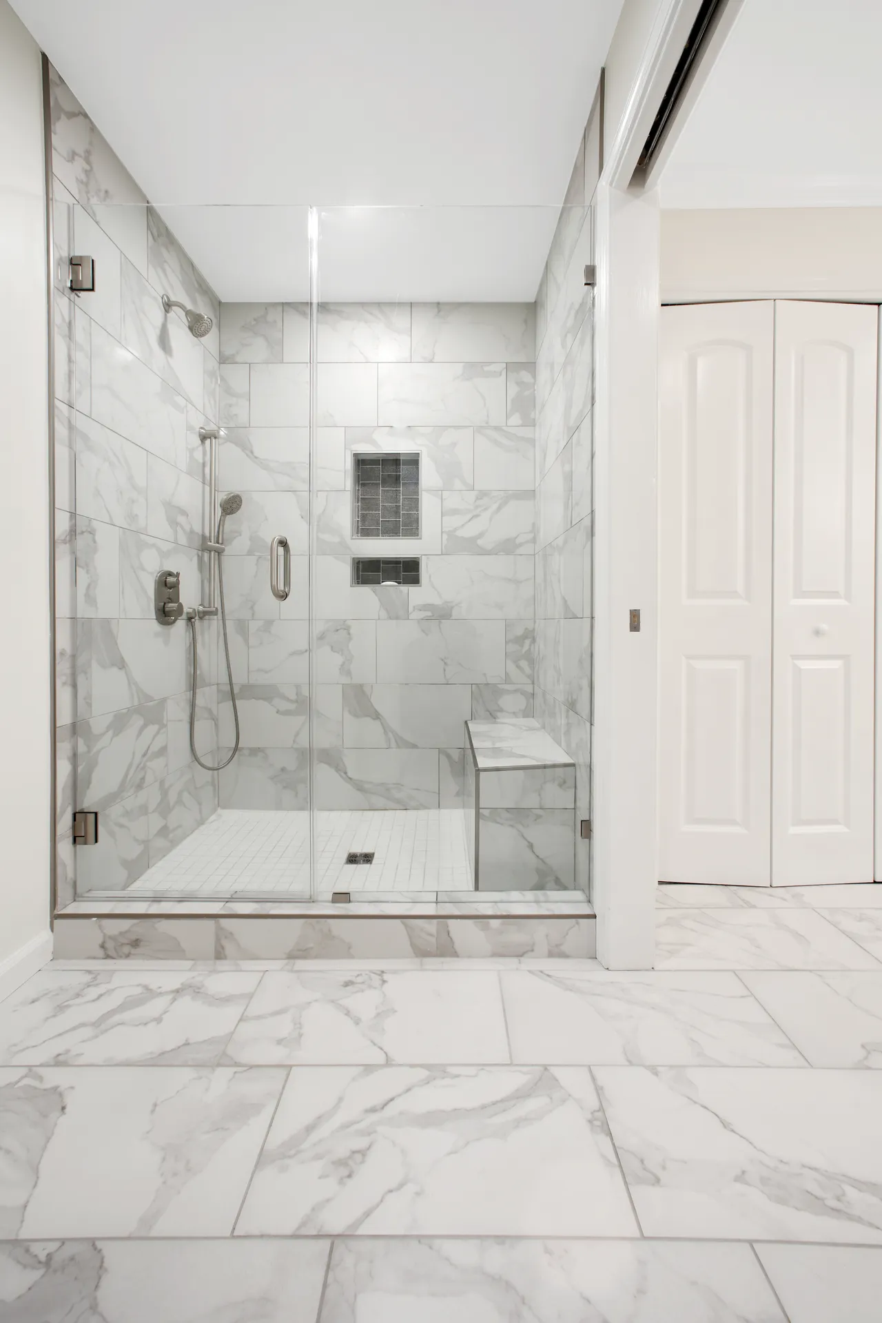 Walk-in shower, Custom tilework — Duluth bathroom remodel by HomeVantage