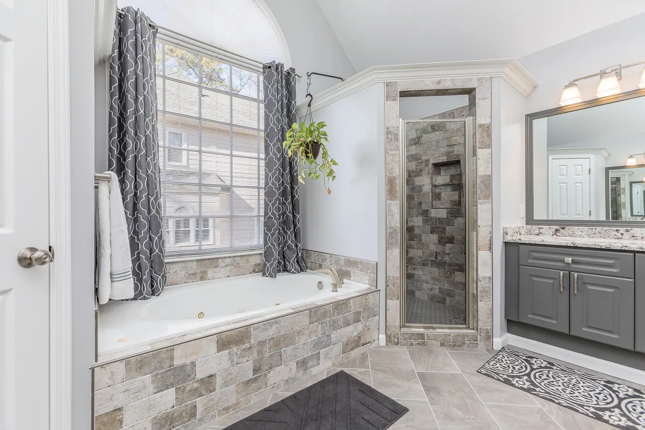 Tub, Custom tilework — Johns Creek bathroom remodel by HomeVantage