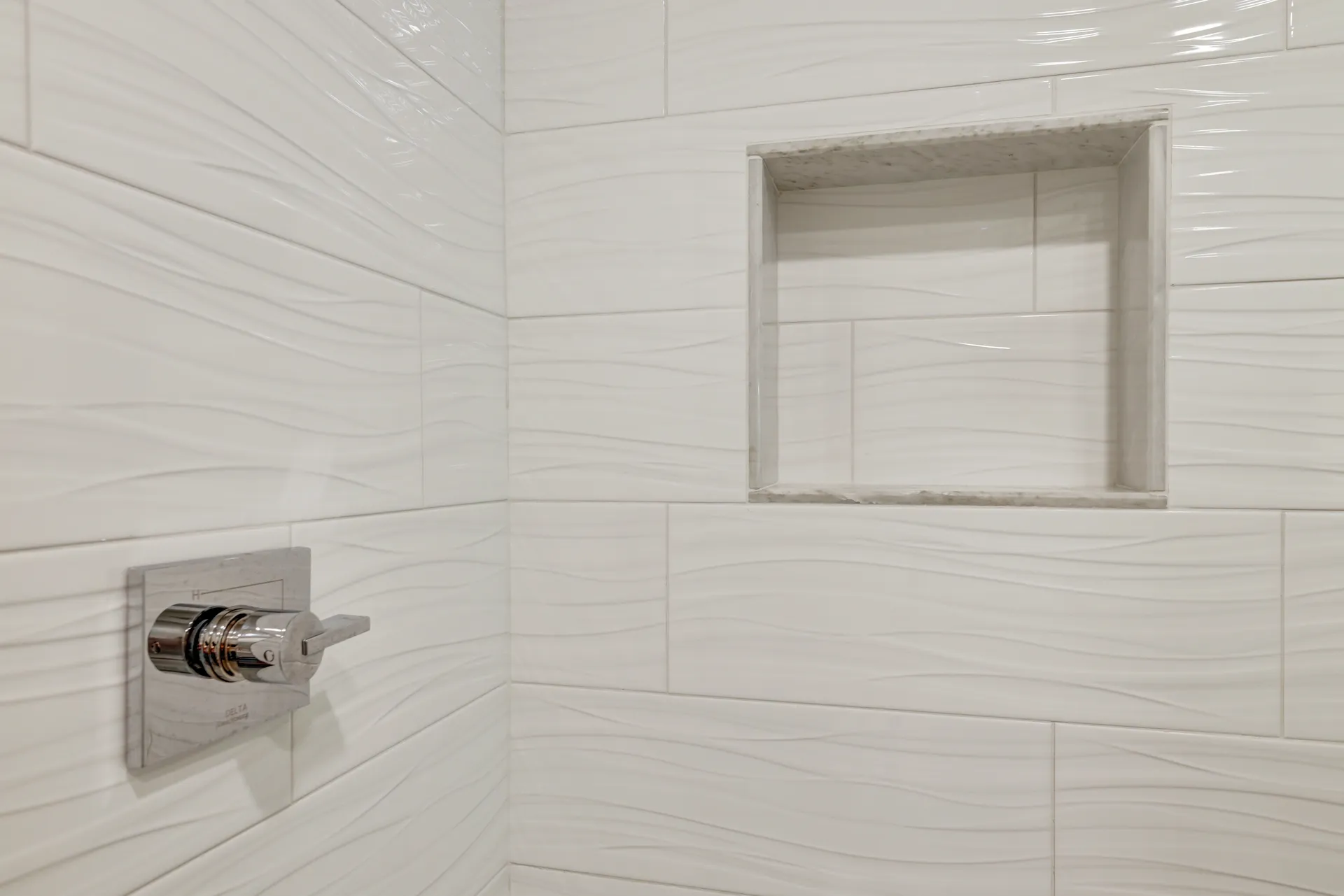Custom tilework — Milton bathroom remodel by HomeVantage