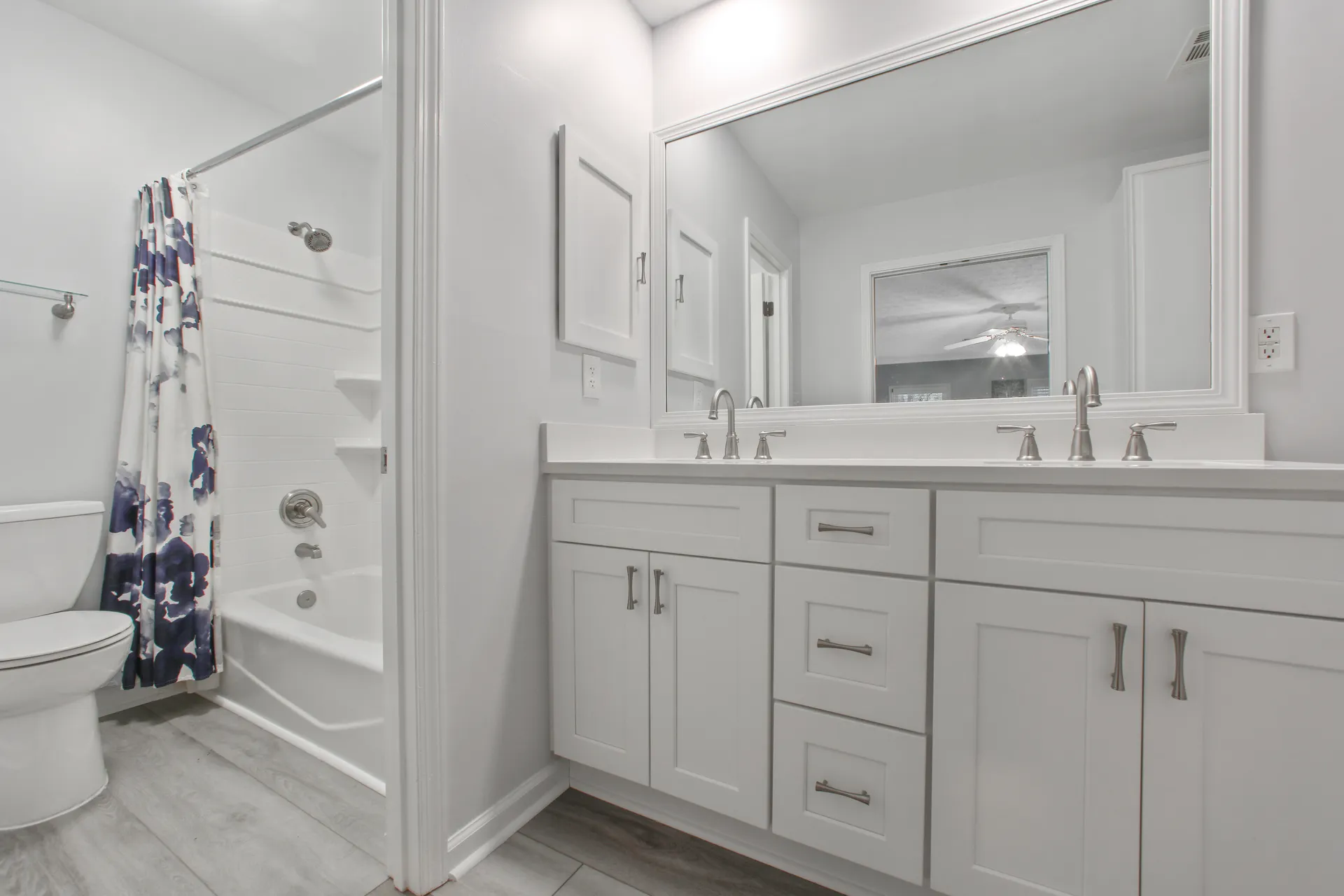 Remodeled bathroom with double vanity in Sugar Hill, GA by HomeVantage