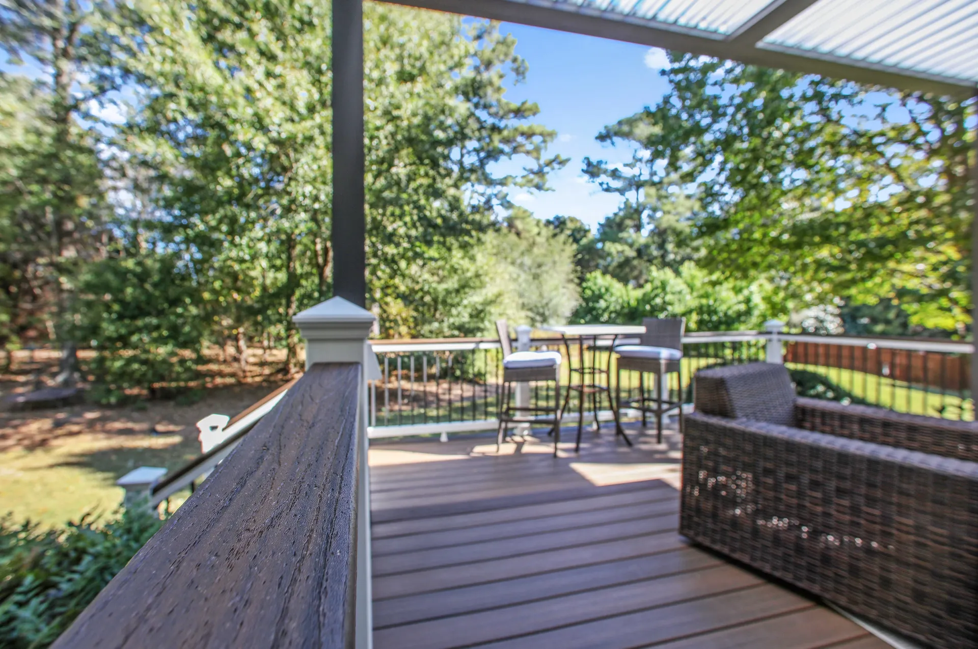 Wide composite deck with covered lounge area built by HomeVantage in Alpharetta, GA