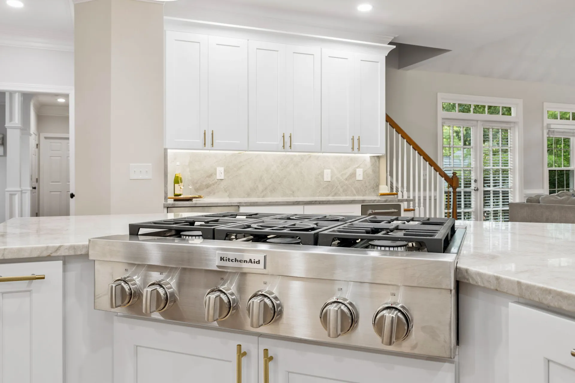 Range hood, Tile backsplash — Alpharetta kitchen remodel by HomeVantage