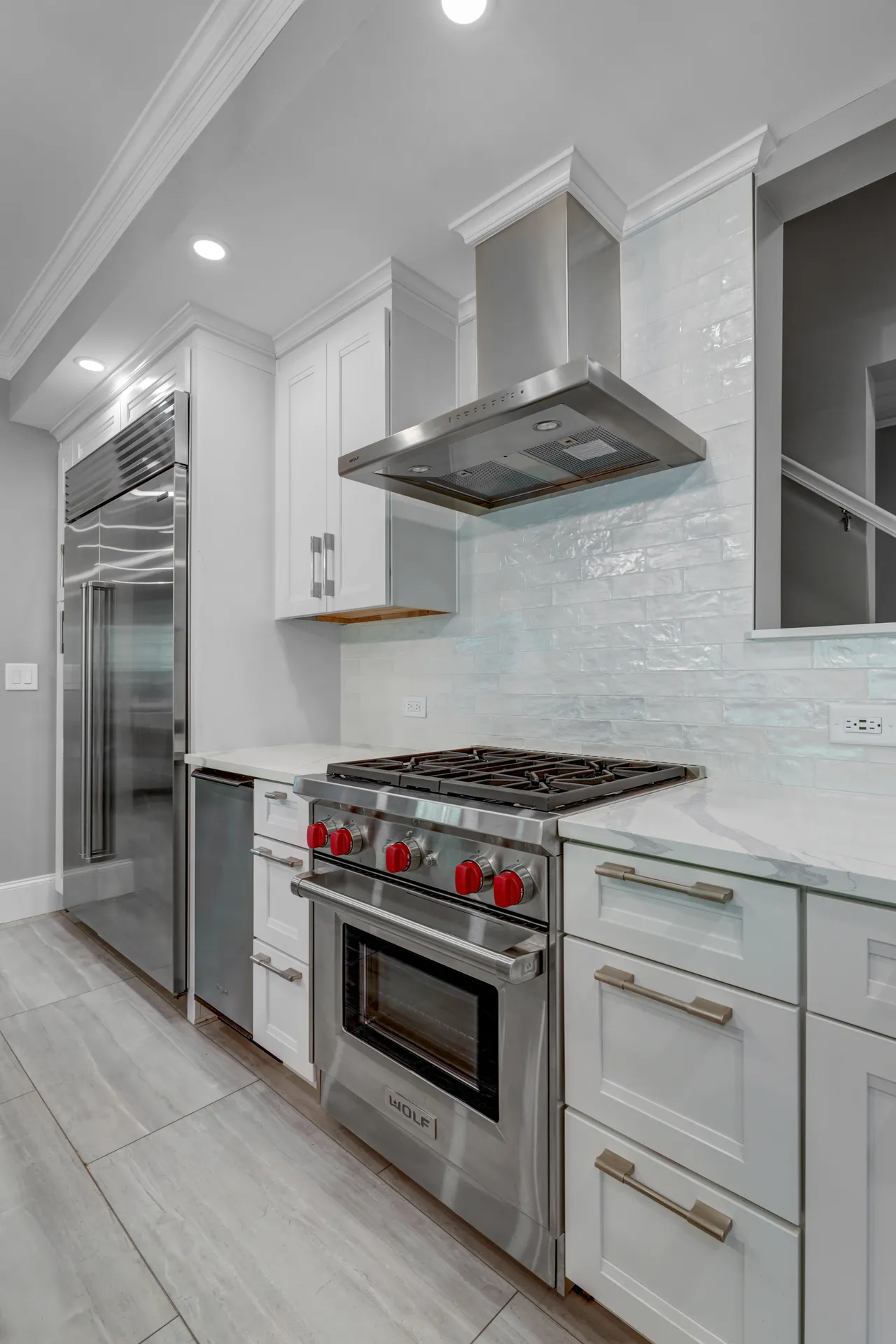 Range hood, Tile backsplash — Alpharetta kitchen remodel by HomeVantage