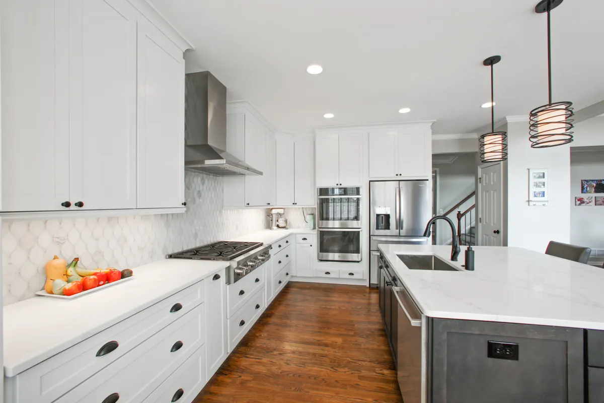 Kitchen island, Range hood — Alpharetta kitchen remodel by HomeVantage
