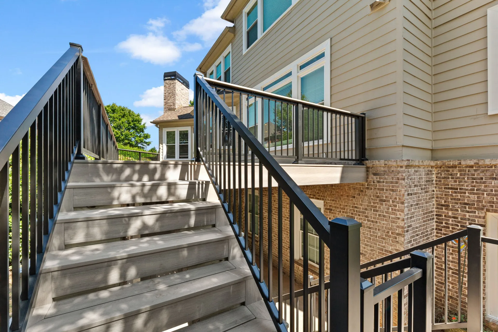 Multi-level open deck in Cumming, GA by HomeVantage